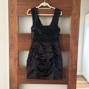 Express black sequin top, satin bottom dress.